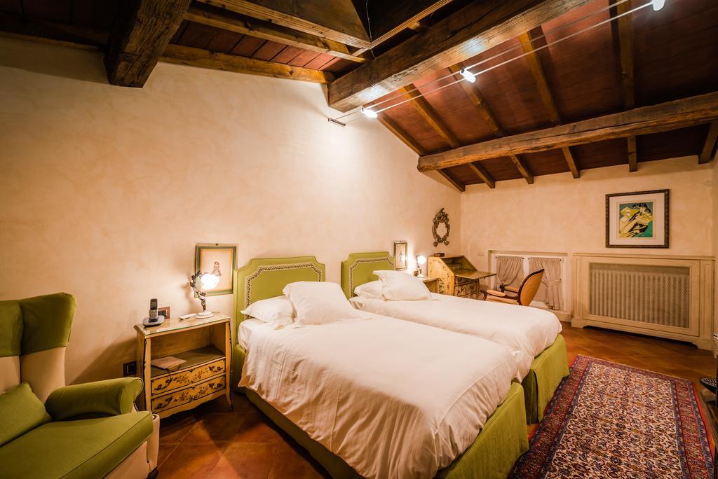 La Torre Dei Canonici Lumellogno Bagian luar foto